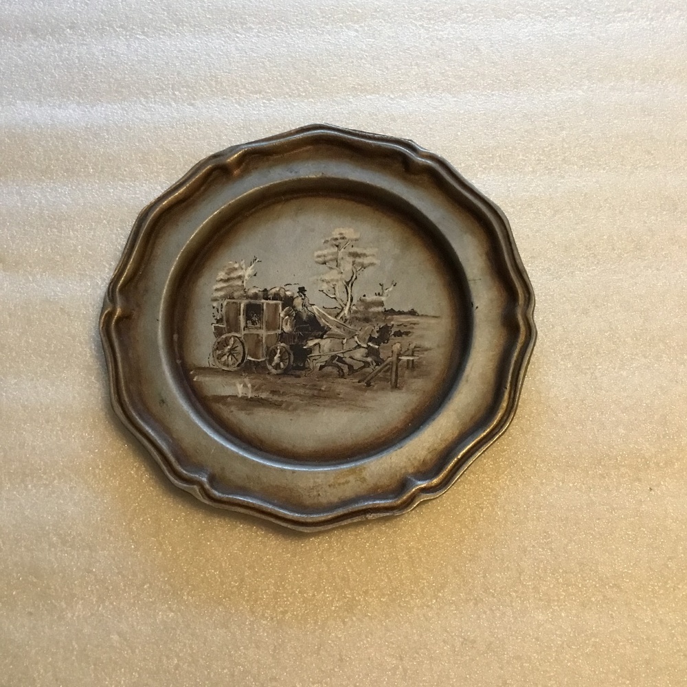 Vintage pewter plate with a painting of stagecoach